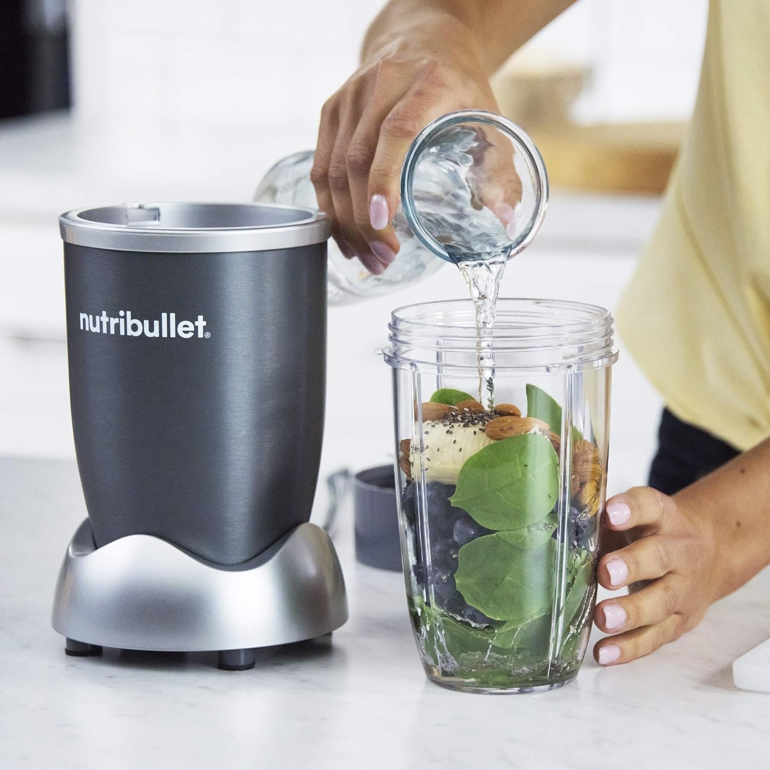 NutriBullet NBR-1201 12-Piece High-Speed Blender/Mixer System, Gray (600 Watts) NutriBullet NBR-1201 12-Piece High-Speed Blender/Mixer System, Gray (600 Watts)