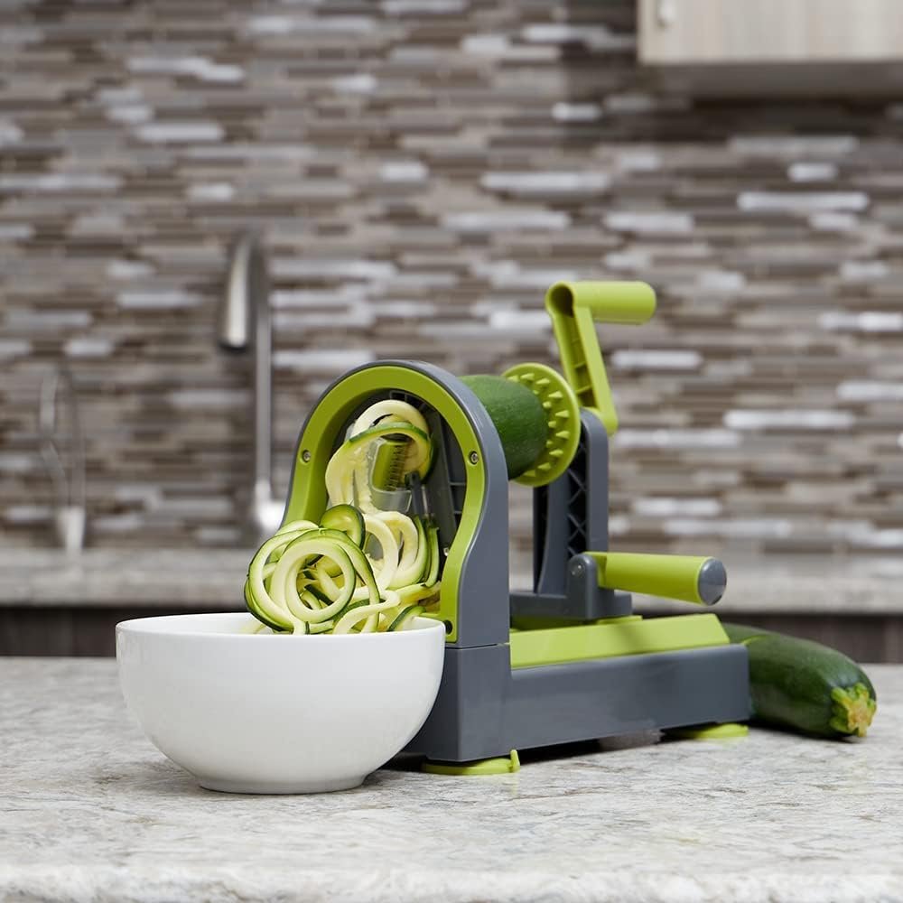 Home Basics 4 Function Tabletop Spiralizer, Green | 4 Razor Sharp Blades | Safety Guards Protect While Using | Durable | Easy to Clean | Great for Vegetables  Fruit | Healthy Way to Prepare Meals Home Basics 4 Function Tabletop Spiralizer, Green | 4 Razor Sharp Blades | Safety Guards Protect While Using | Durable | Easy to Clean | Great for Vegetables  Fruit | Healthy Way to Prepare Meals